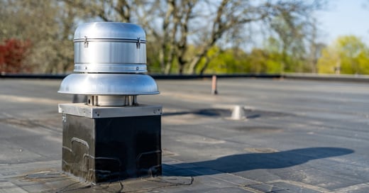 What Causes Commercial Roof Leaks (And Why They’re Rarely Where You Think)