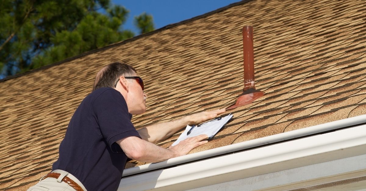 Professional roofing consultation before a residential roof replacement project